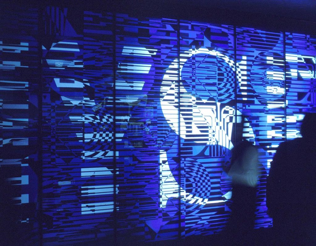 Crypto Derivatives Move Toward Cleared, Regulated Venues Trading screens in a market setting