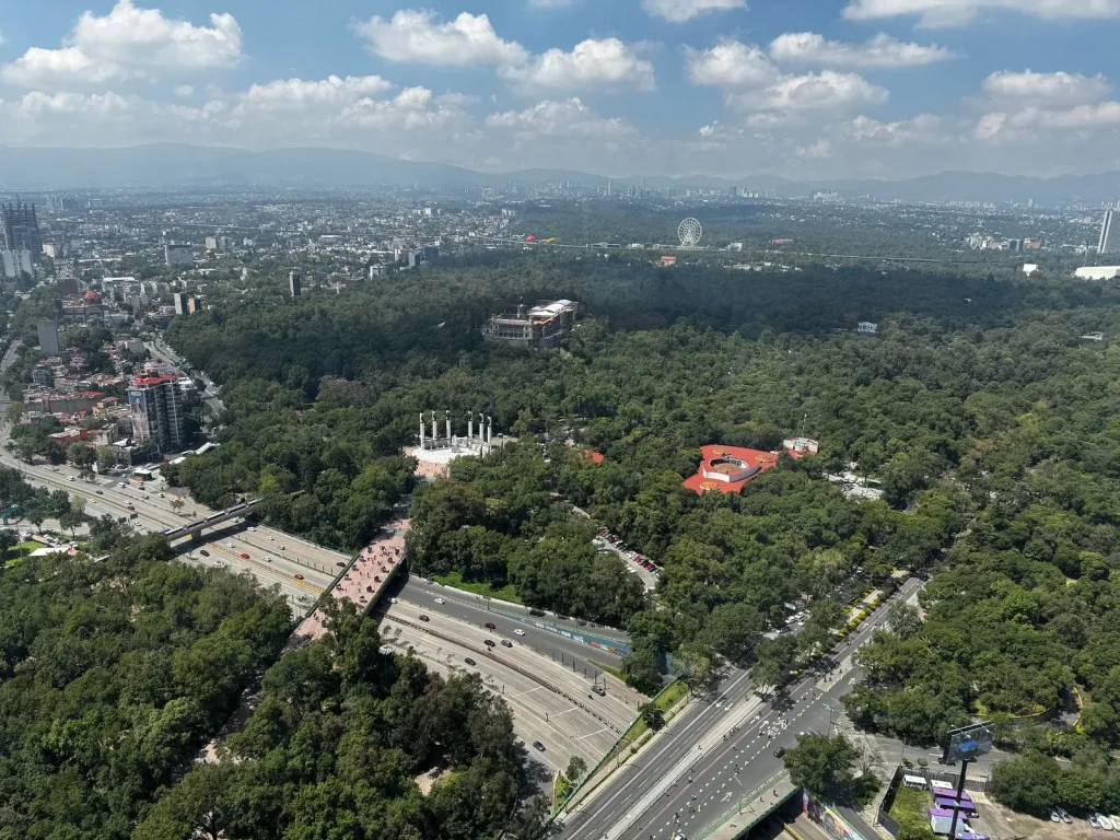 Mexico Takes Its Place in the Global Child Online Safety Wave Aerial view of Chapultepec Park with the Mexico City skyline and mountains behind it.