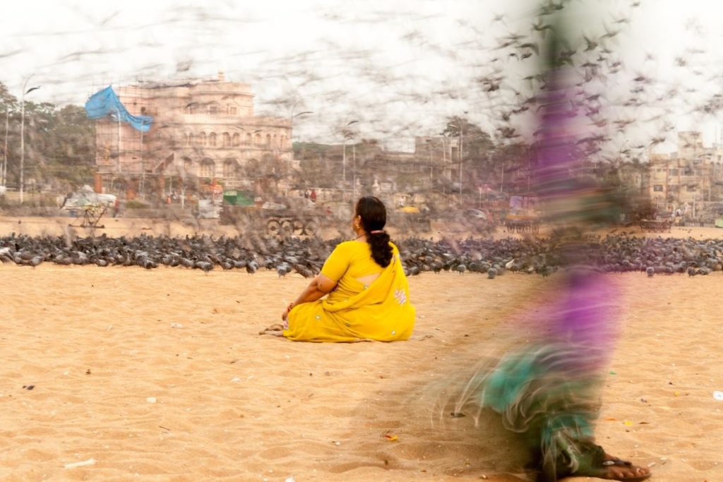Woman meditating at home calmly