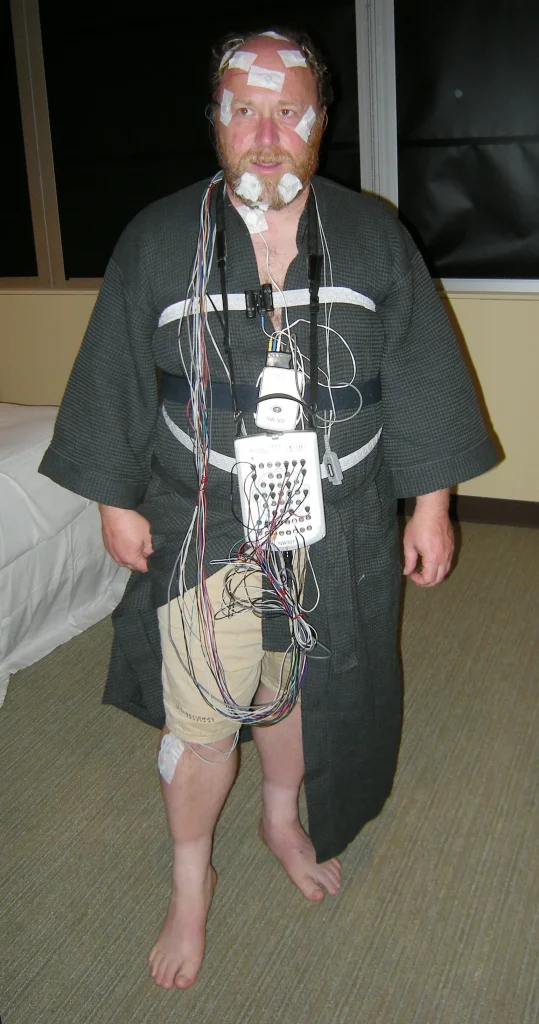 Sleep and Memory: Why a Good Night Helps Learning Stick A patient wired with sensors takes part in an overnight sleep study at a laboratory.