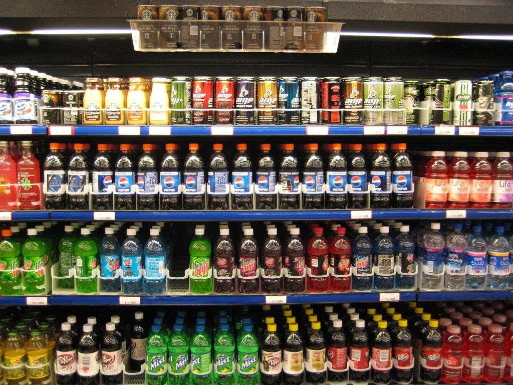 Supermarket shelves with packaged foods illustrating the ultra-processed food debate